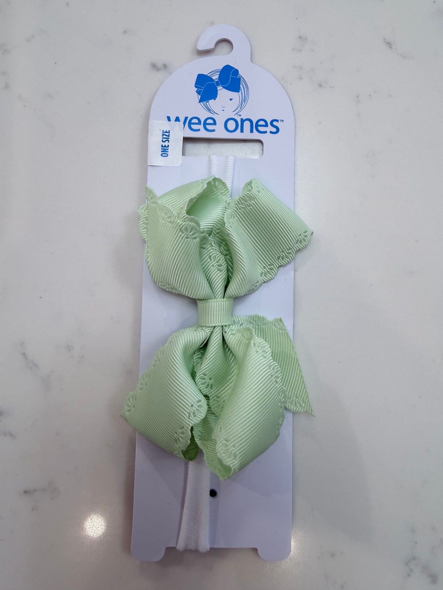Small Grosgrain Hair Bow with Embossed Eyelet Edge on White Nylon Band