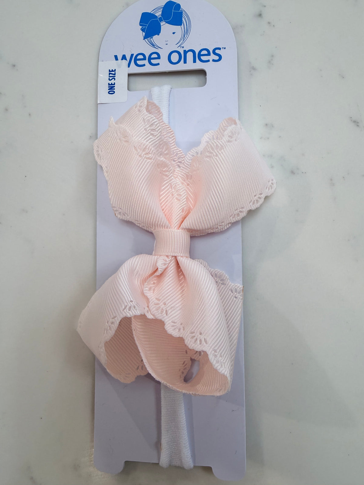 Small Grosgrain Hair Bow with Embossed Eyelet Edge on White Nylon Band